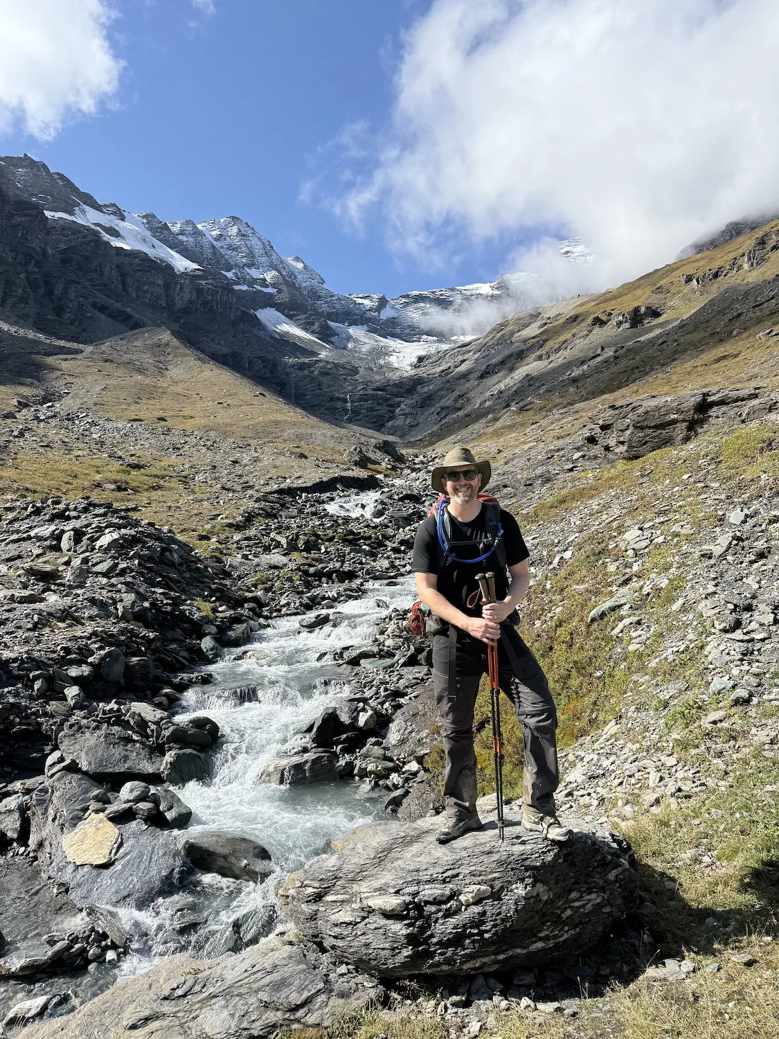 Man in front of stream