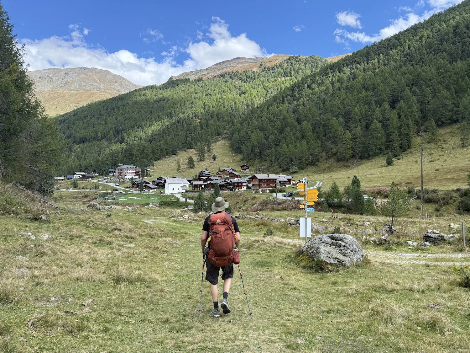 Man walking into small town