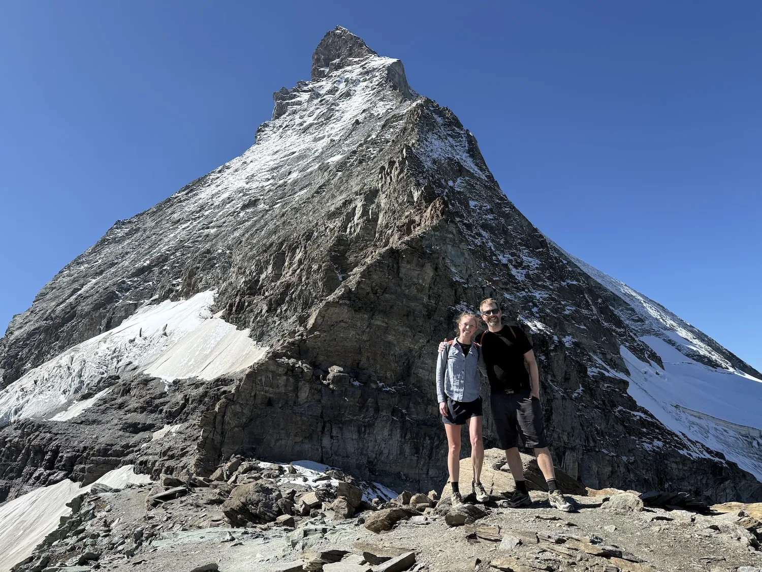 Couple on high point in front of the Matterhorn