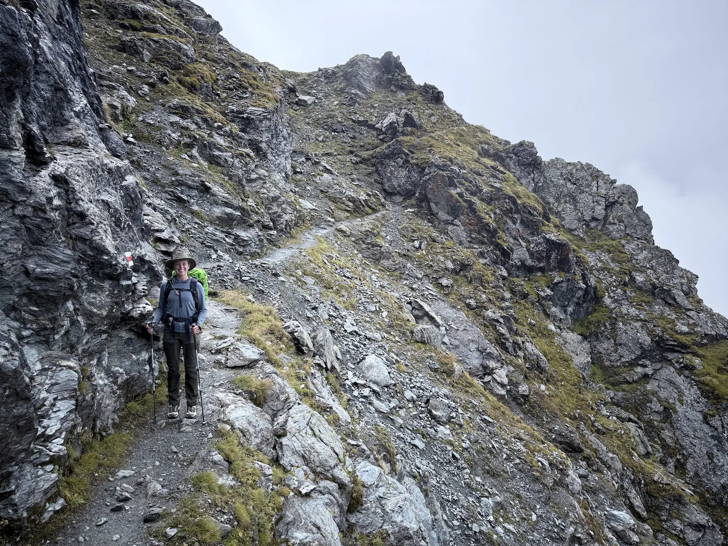 Woman hiking in rocky terrain