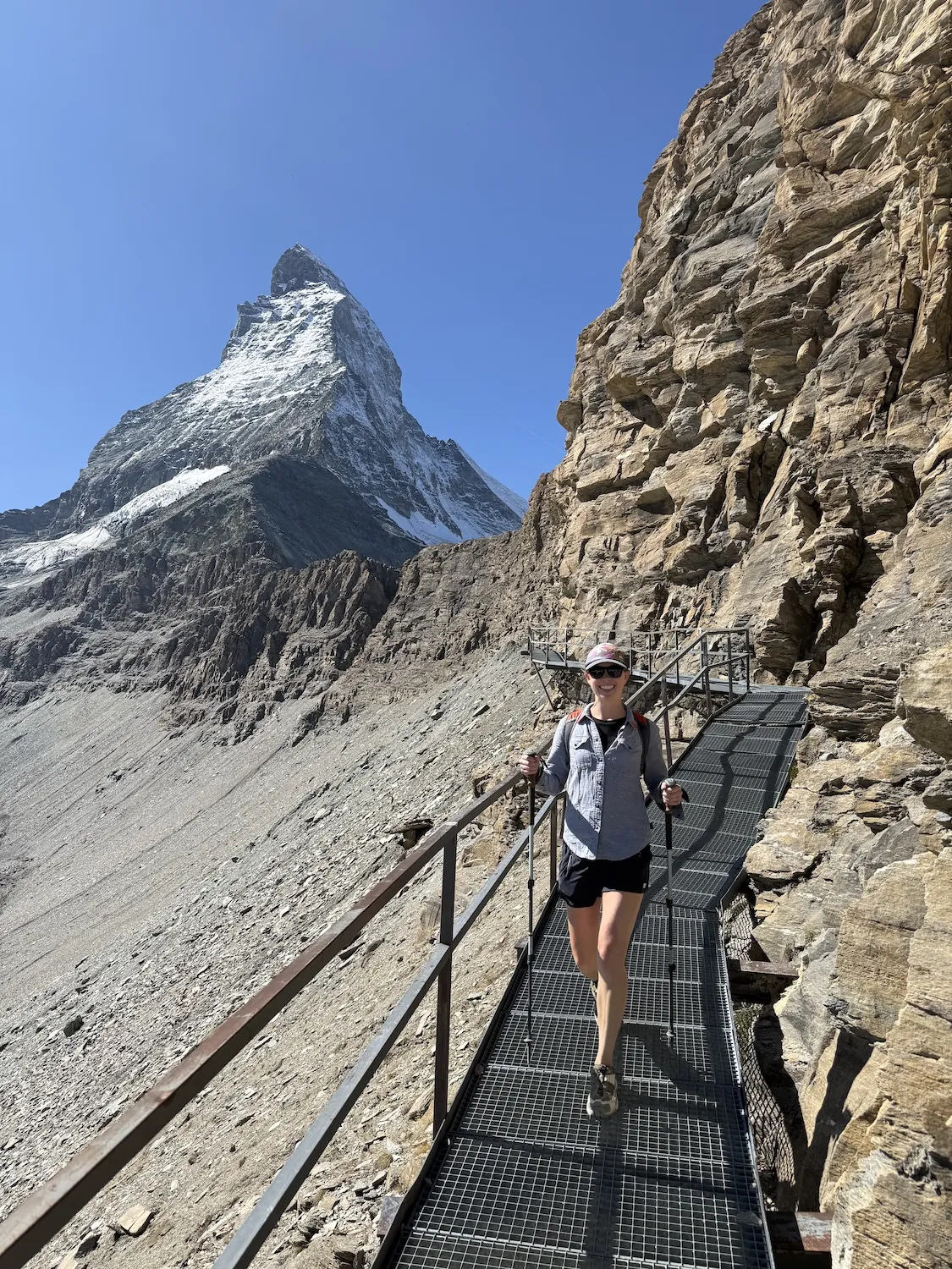 Woman on bridge in front of the Matterhorn