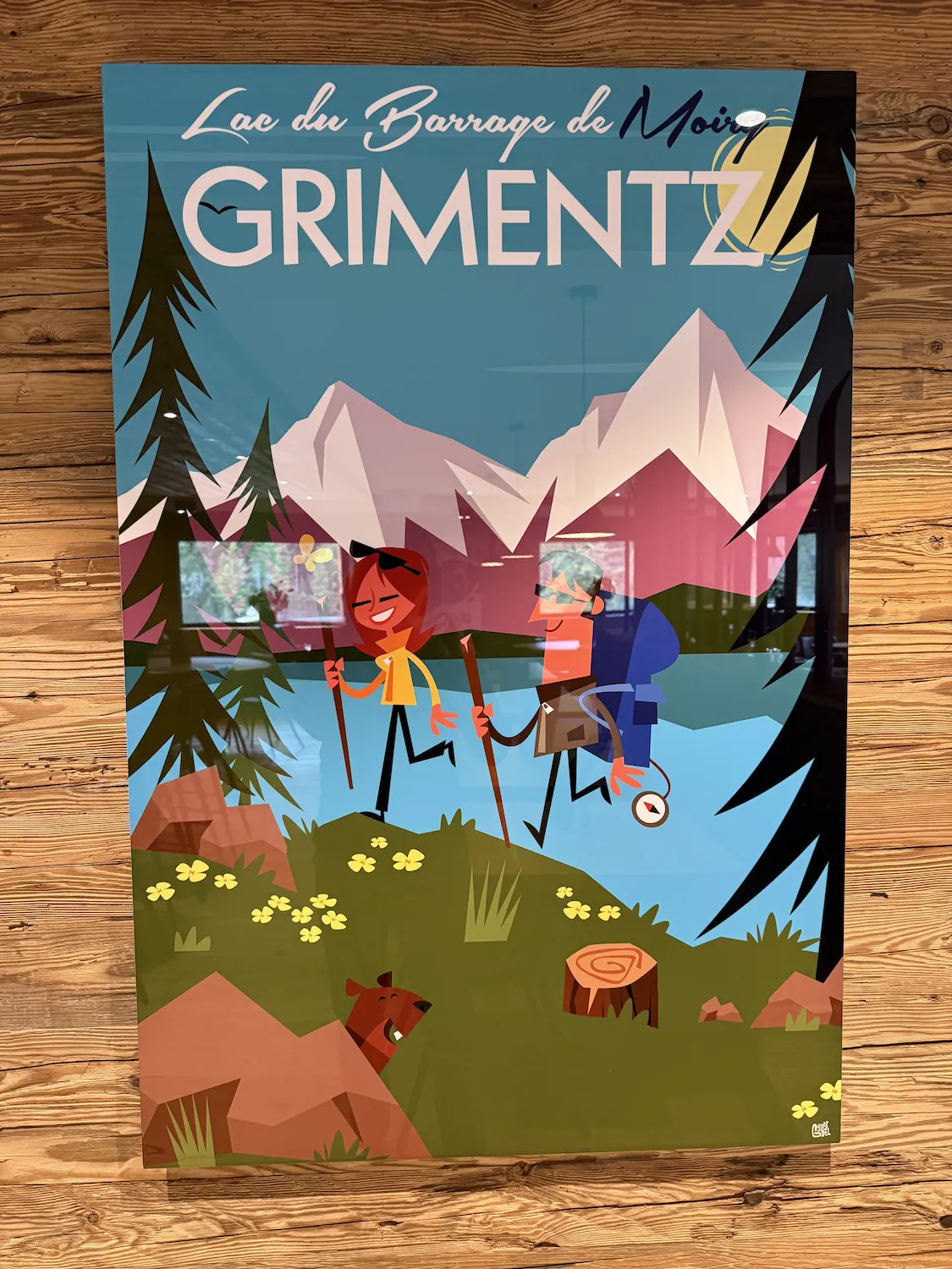 Poster with two people walking by a lake