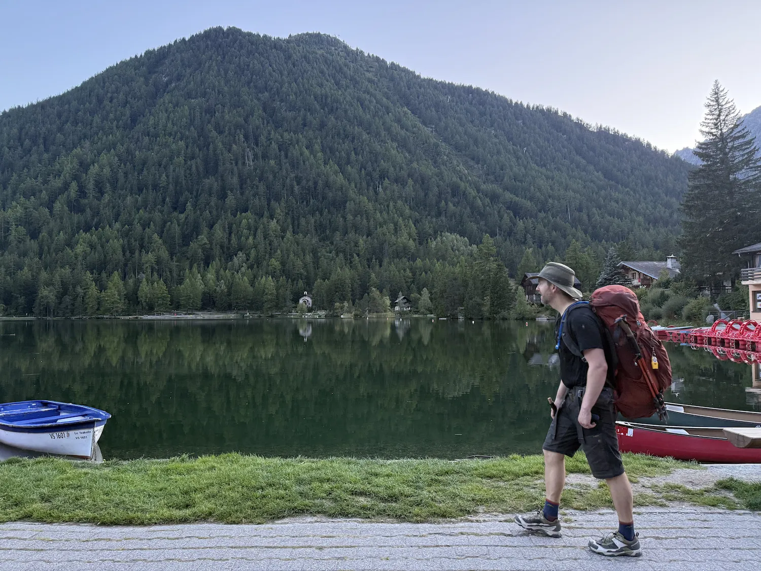 Grant walking in front of lake