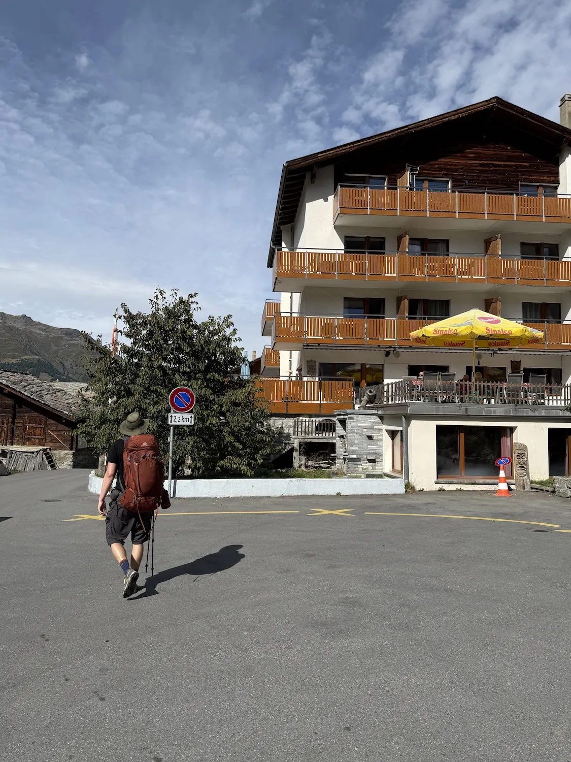 Man walking towards hotel