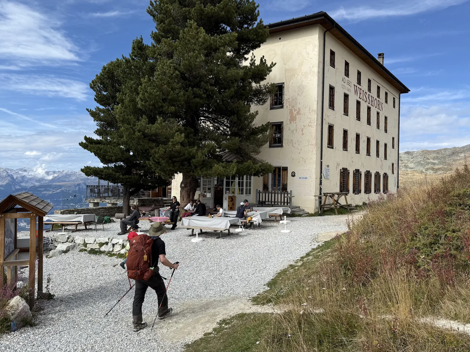 Man walking up to hotel