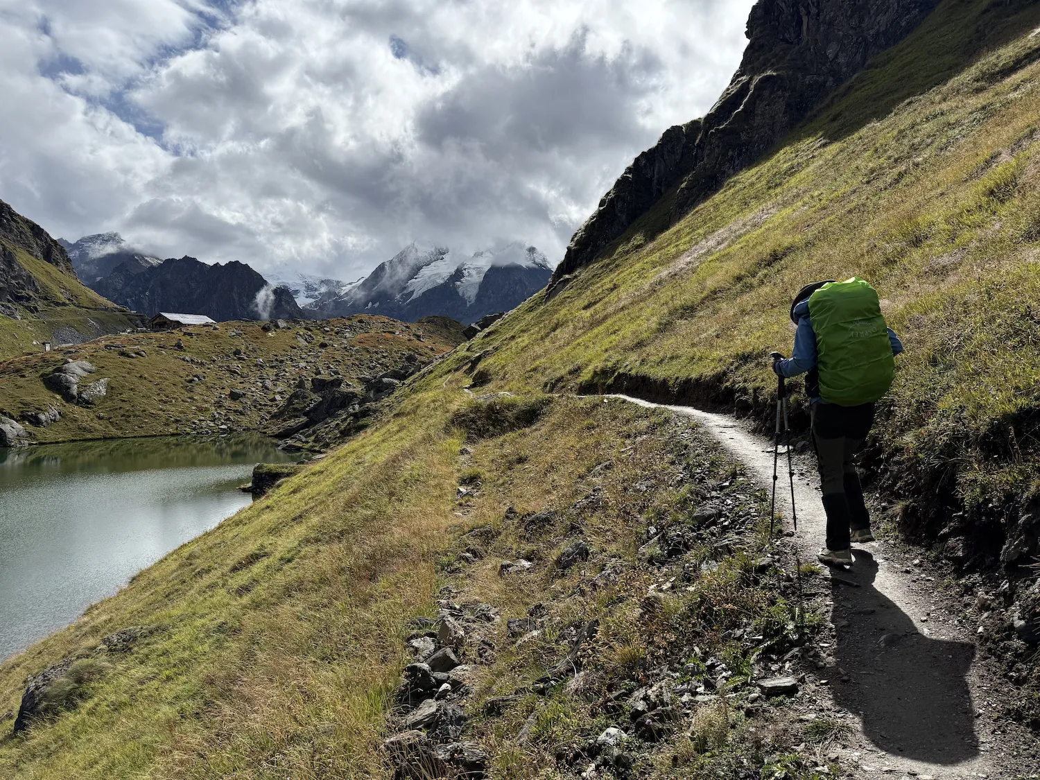 Woman hiking next to a lake