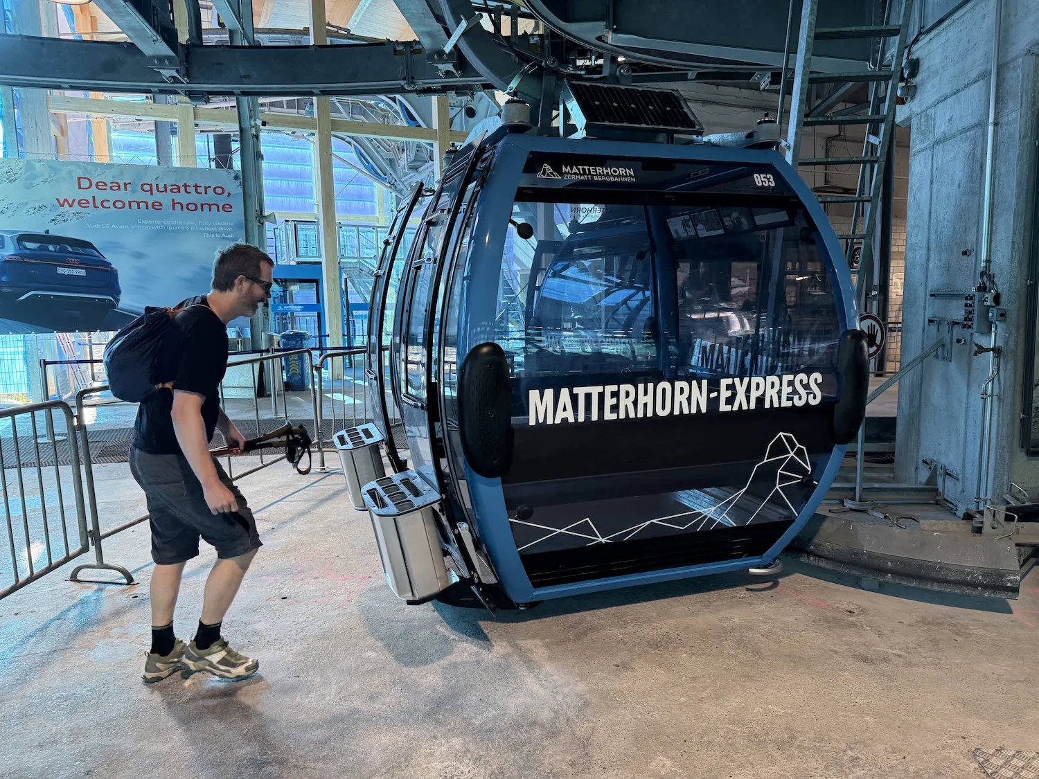 Man walking onto gondola