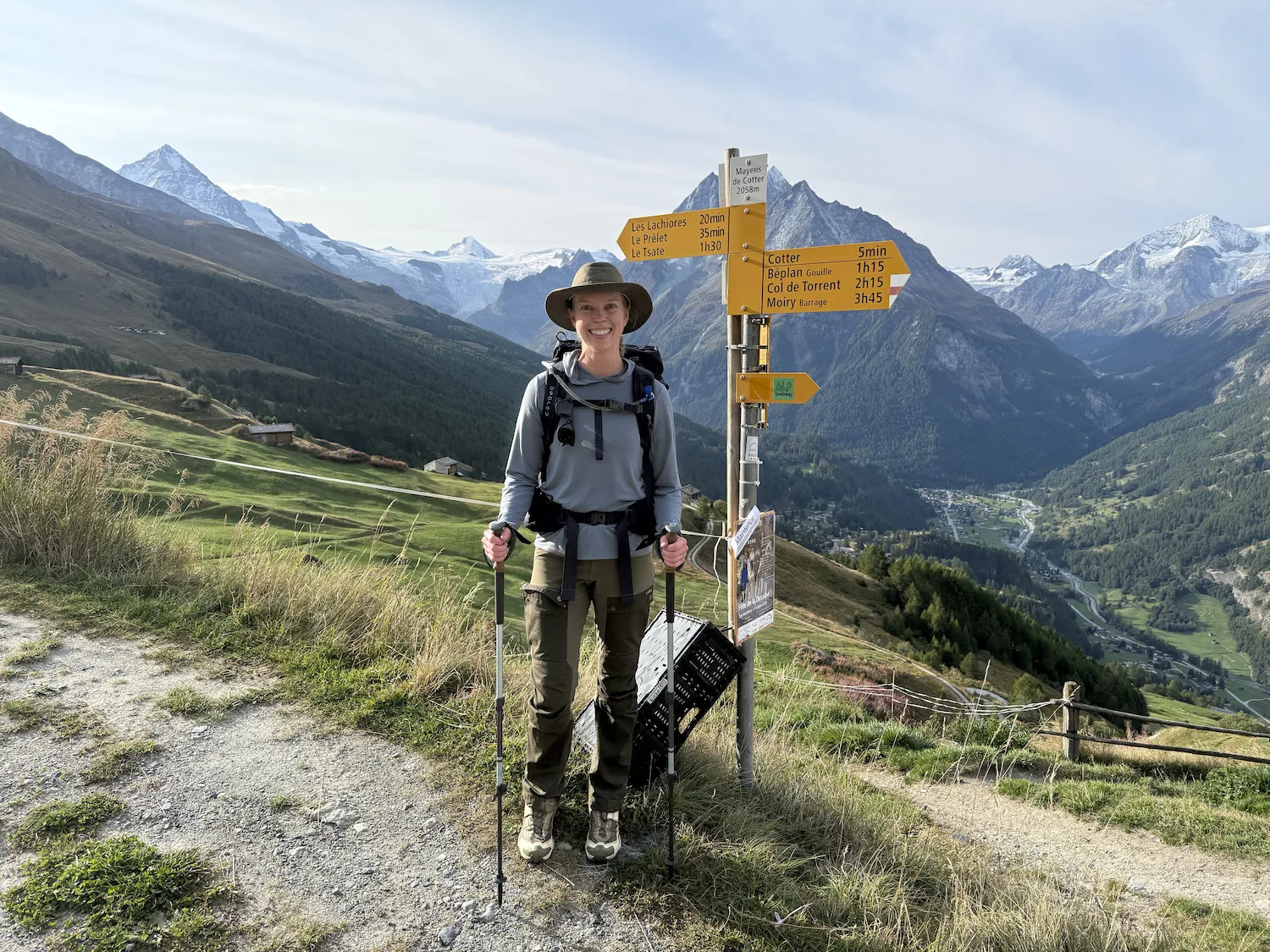 Woman in front of sign