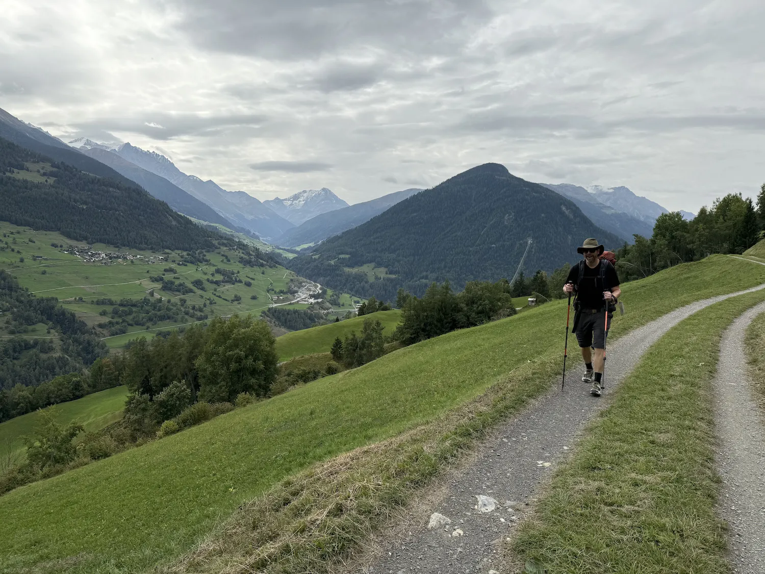 Grant walking on path in green farmland
