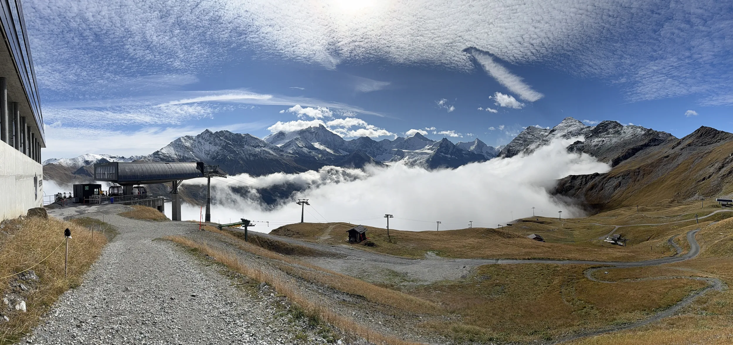Gondola and clouded mountains