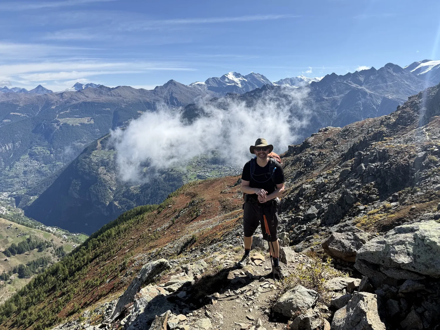 Man above small mountain town