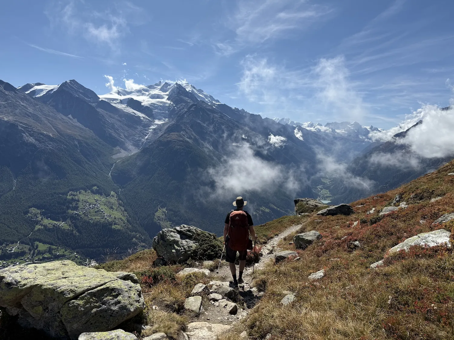 Man walking into tiny cloud