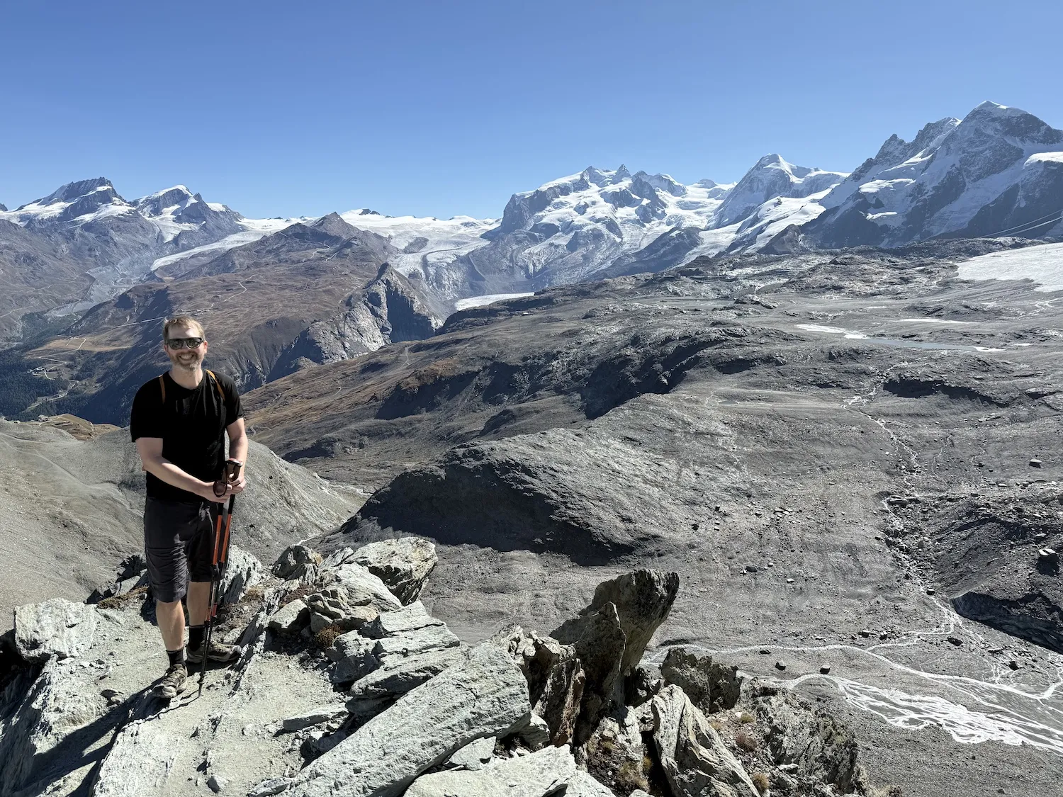 Man in front of mountain range