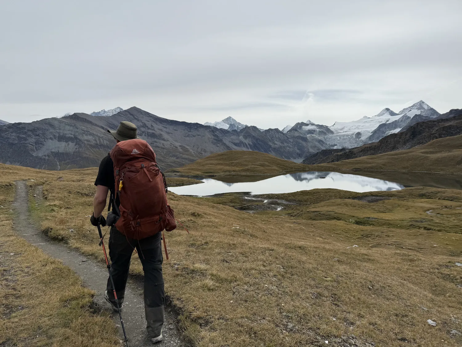 Man walking near lake