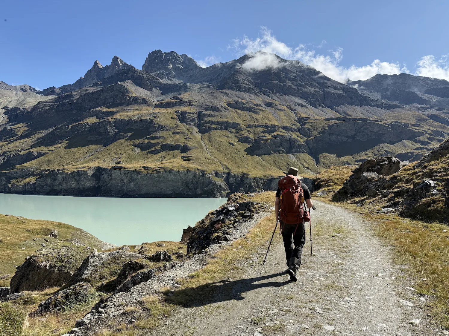 Man walking by lake