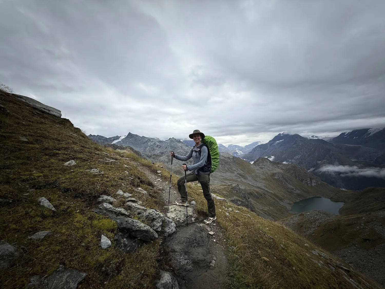 Woman posing on path in mountains